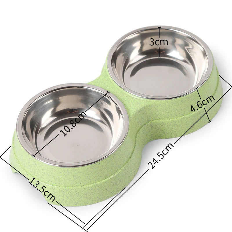 Double pet bowl with two stainless steel dishes on green base, 24.5cm long, 13cm wide