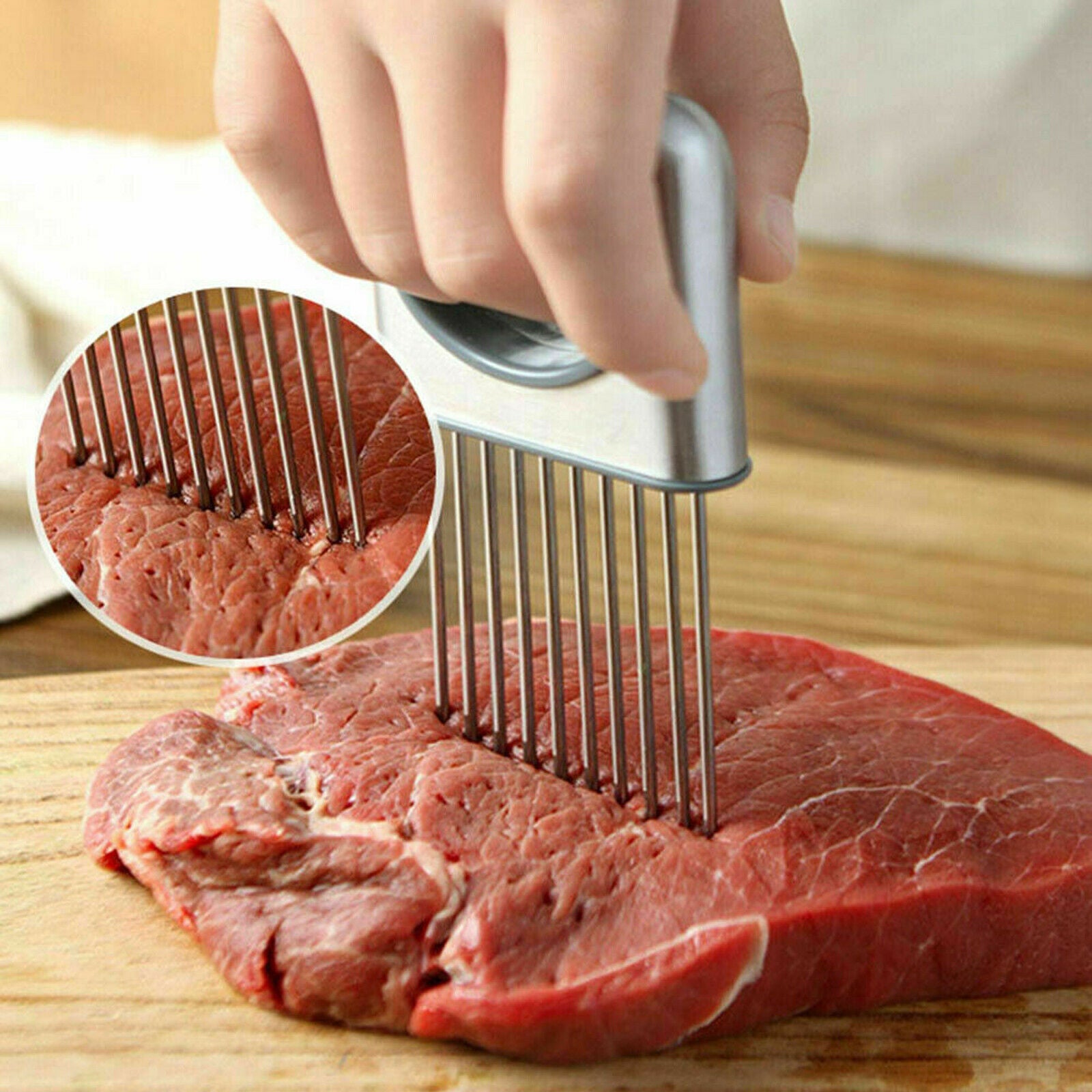 Stainless steel slice holder slicer pressing prongs into sliced meat