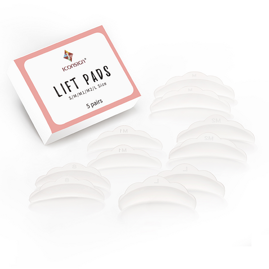 Lash lift kit lift pads set with silicone shields in white and pink packaging