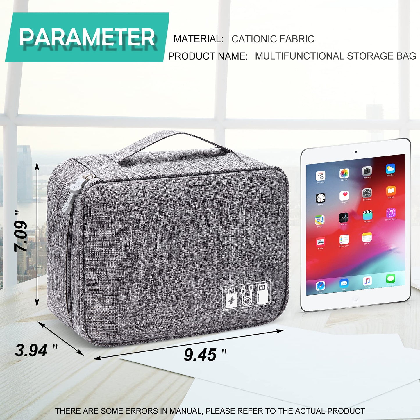 Gray fabric travel cable organizer bag with top handle and front utility icon patch