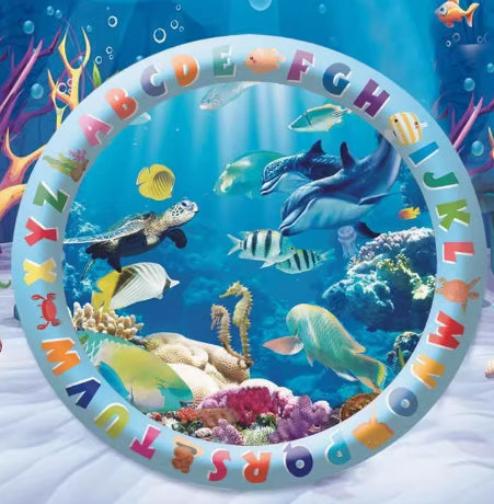 Inflatable pet cooling water mat with colorful underwater alphabet border and sharks