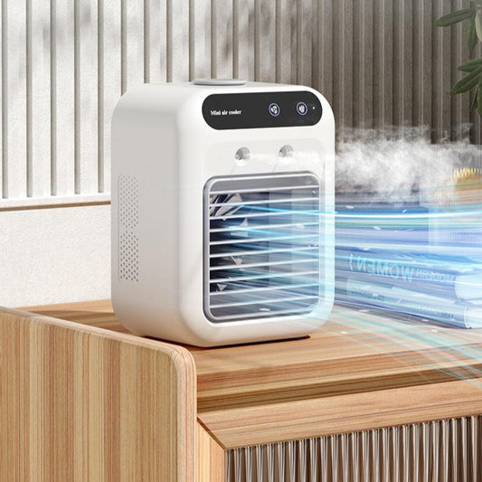 Ivory mini air cooler fan with front grille, top controls, and visible mist stream